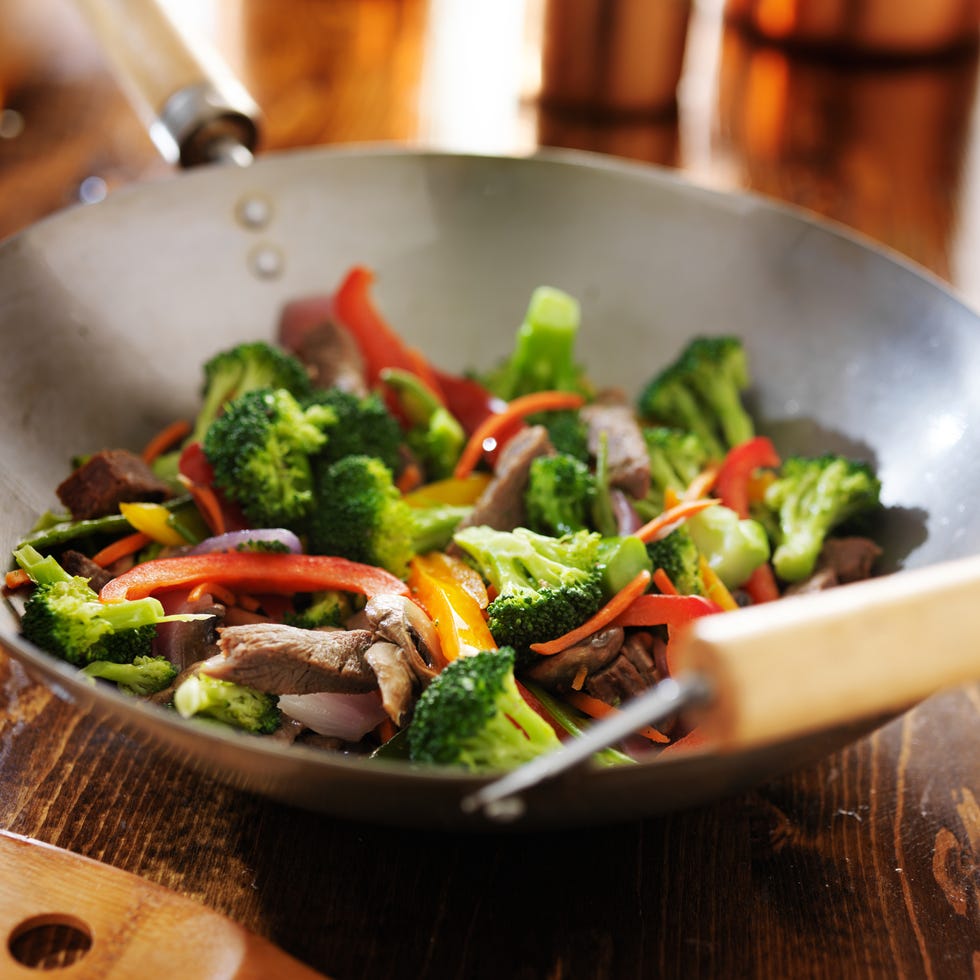 chinese stir fry in metal wok